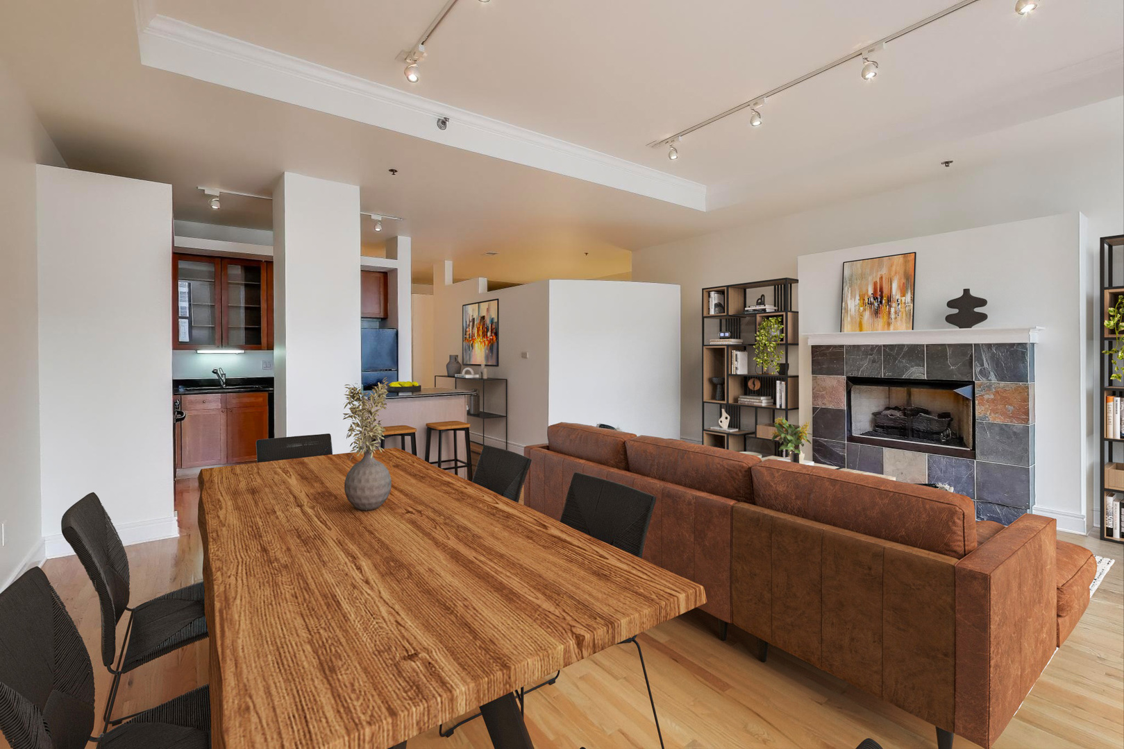 212 West Washington Street, Unit 1708 Chicago, IL 60606 - Photo 4 of 36 a living room with furniture a flat screen tv and a fireplace