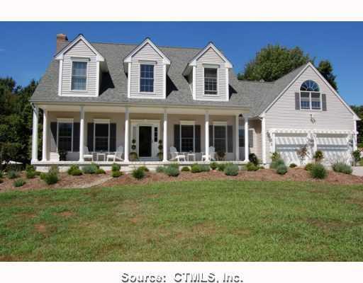 a front view of house with yard