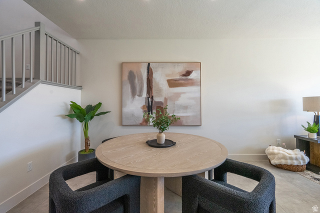 2972 West 570 North Hurricane, UT 84737 - Photo 42 of 104 Dining room featuring baseboards and stairs