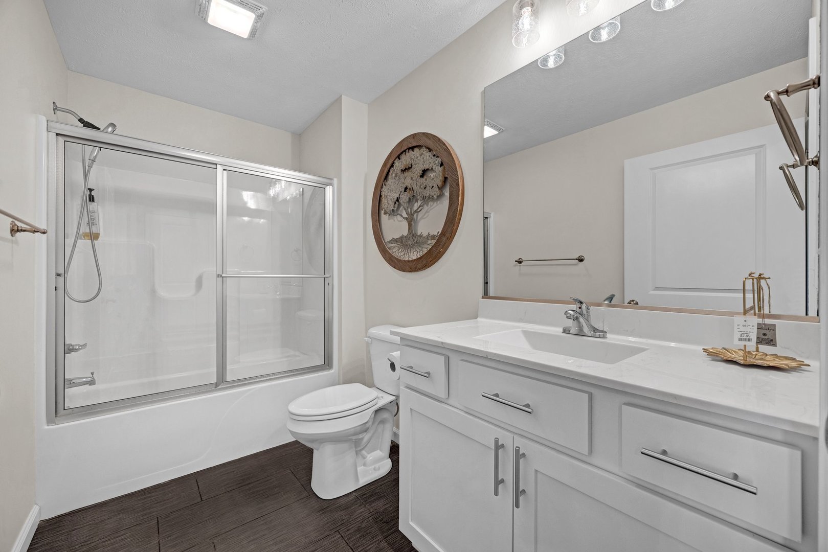 277 Cassidy Road Normal, IL 61761 - Photo 20 of 42 a bathroom with a toilet a sink and a large mirror