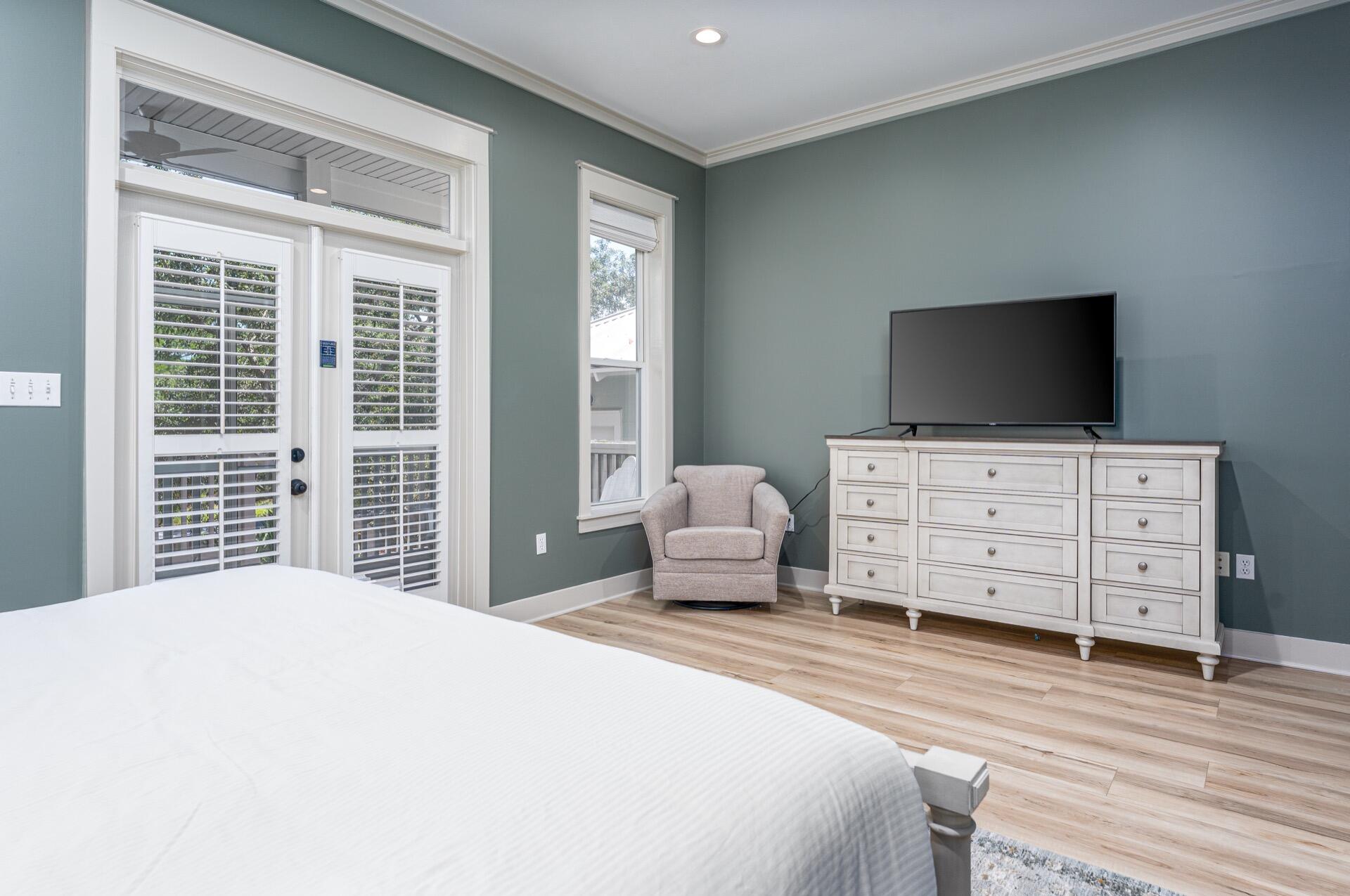 186 Old Beach Road Santa Rosa Beach, FL 32459 - Photo 10 of 21 a bedroom with a bed and wooden floor
