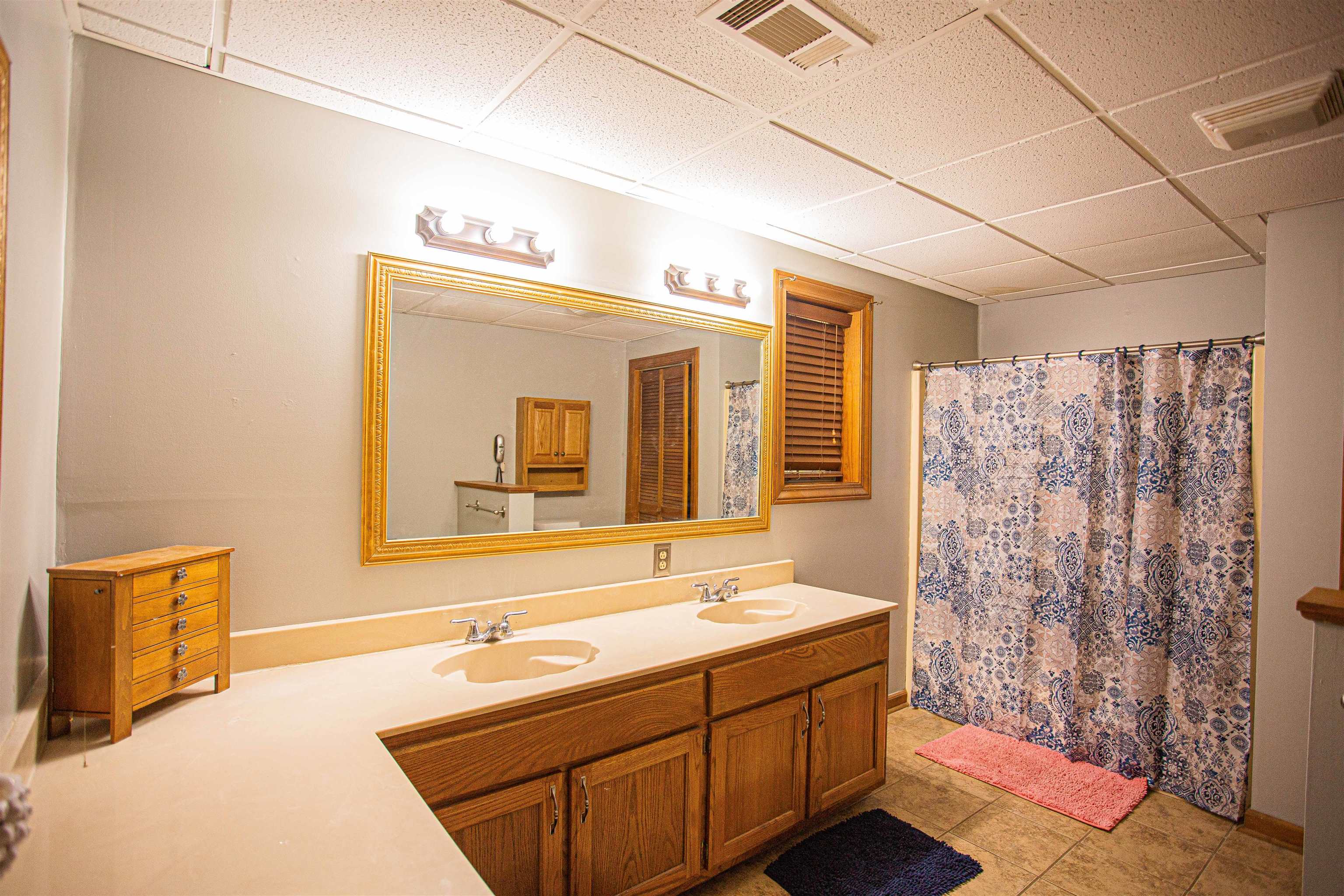 90 Aubrey Lane Ripley, TN 38063 - Photo 14 of 25 a bathroom with a tub sink and mirror