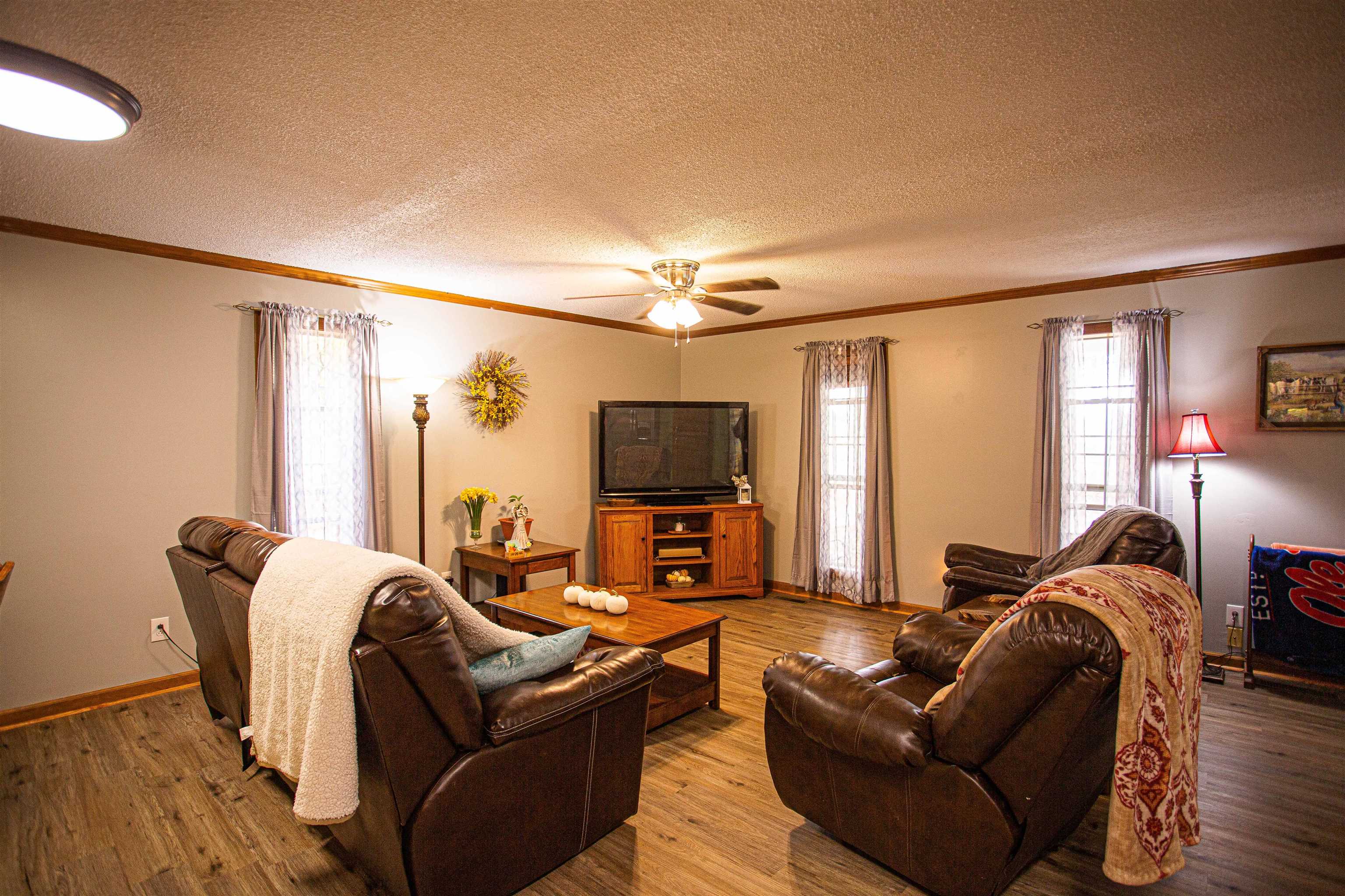 90 Aubrey Lane Ripley, TN 38063 - Photo 2 of 25 a living room with furniture and a flat screen tv