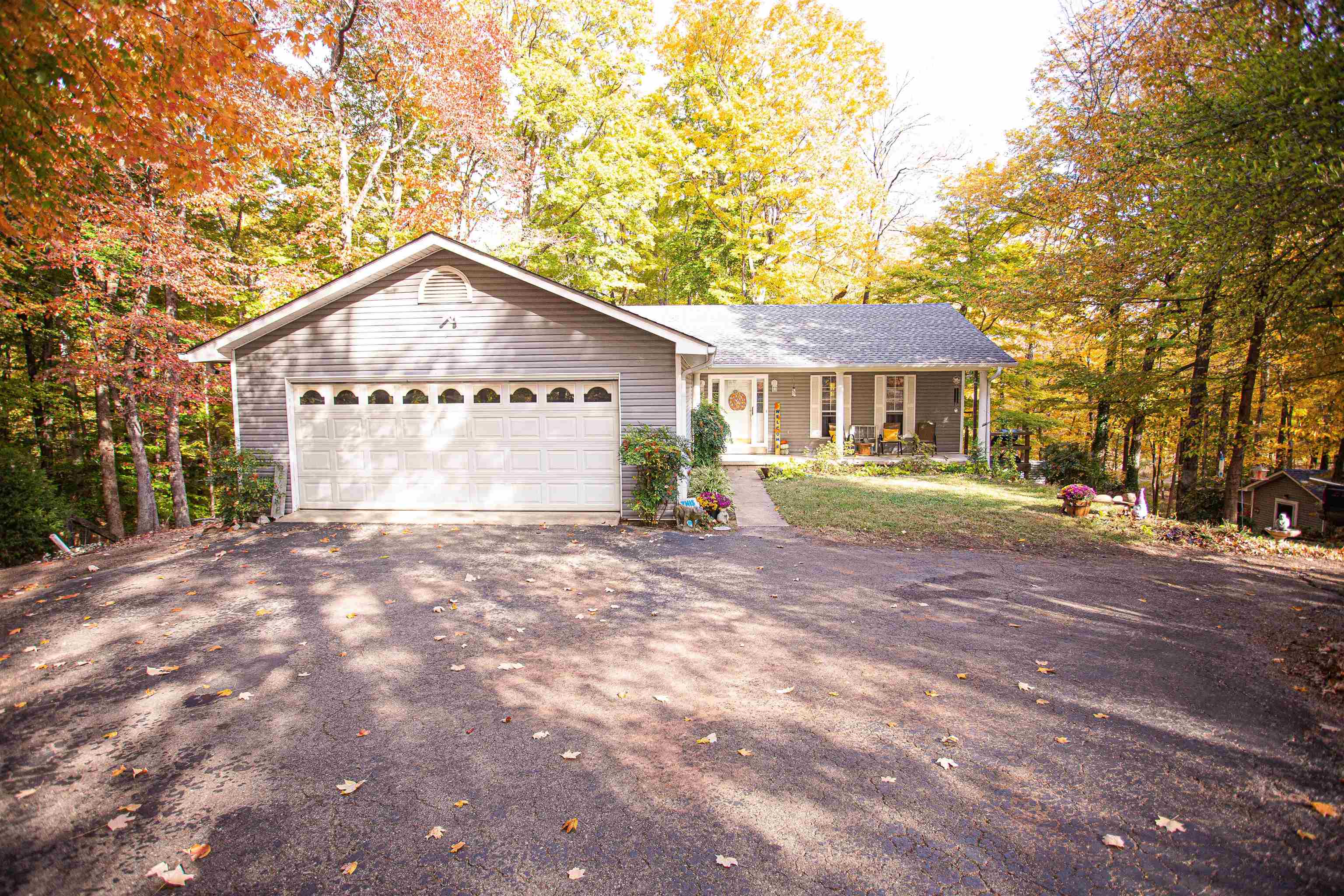90 Aubrey Lane Ripley, TN 38063 - Photo 24 of 25 a front view of a house with a garden