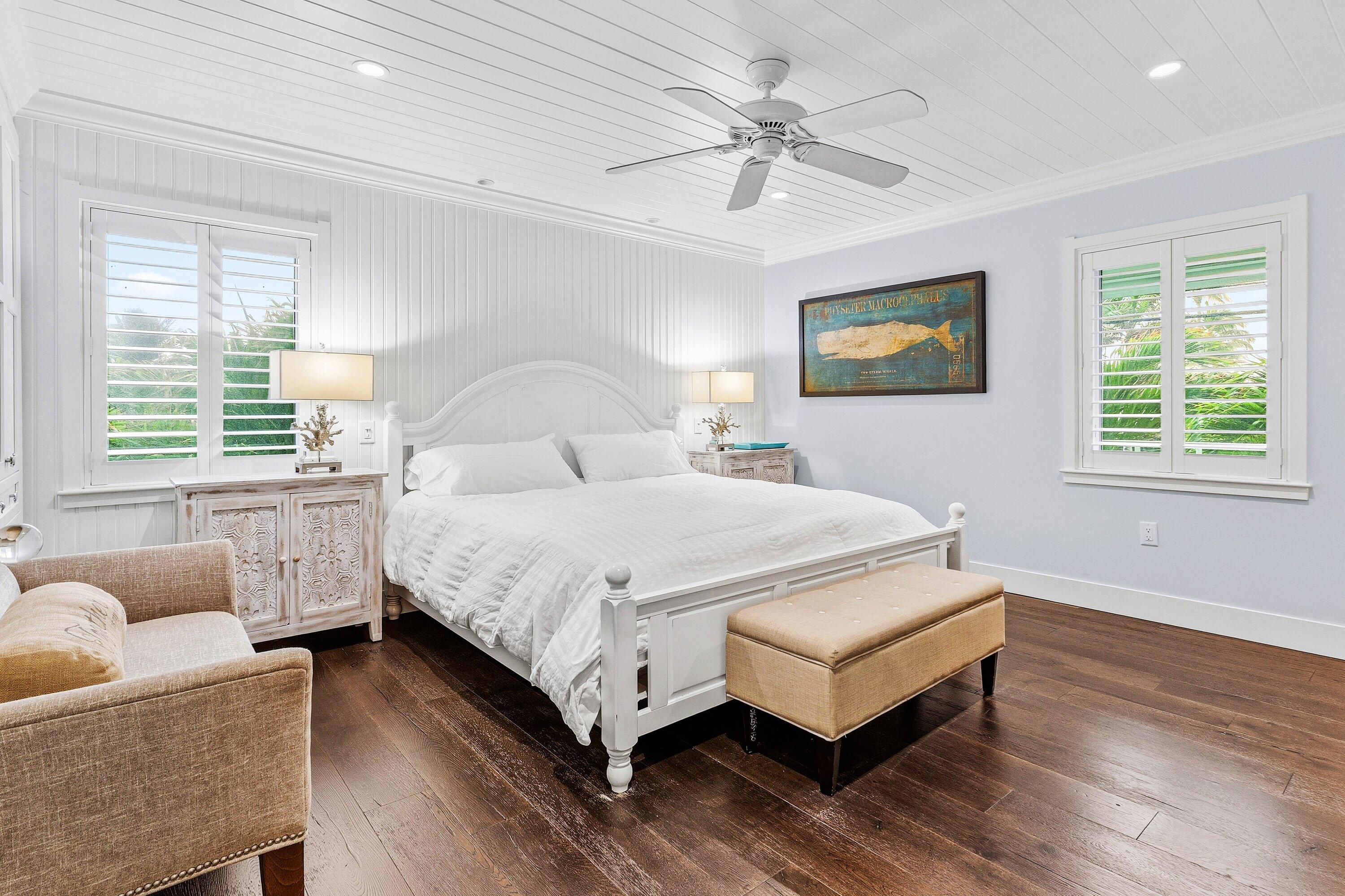 3421 South Ocean Boulevard, Unit 1 Highland Beach, FL 33487 - Photo 17 of 42 a bedroom with a bed couch and window