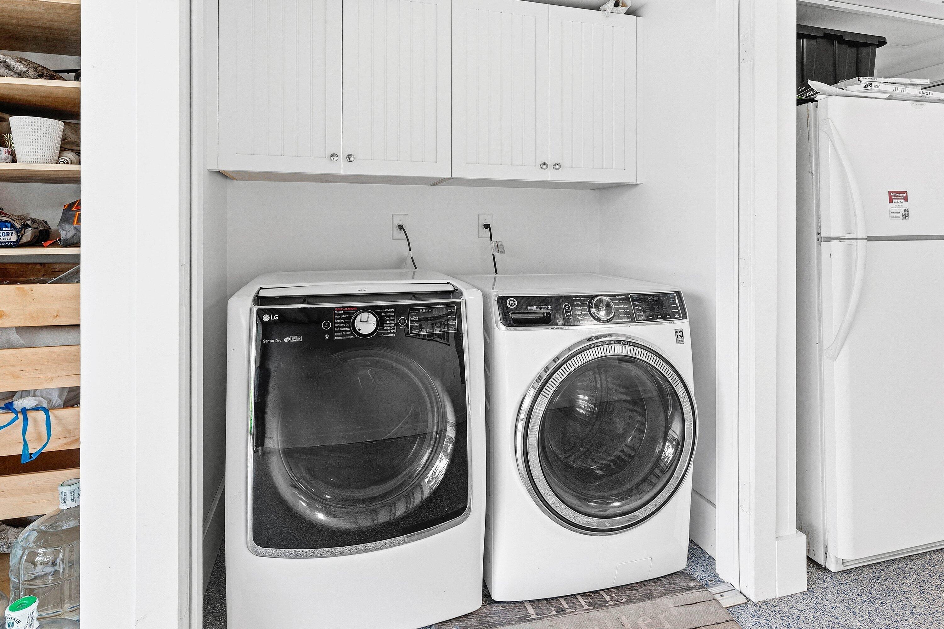 3421 South Ocean Boulevard, Unit 1 Highland Beach, FL 33487 - Photo 29 of 42 a utility room with dryer and washer