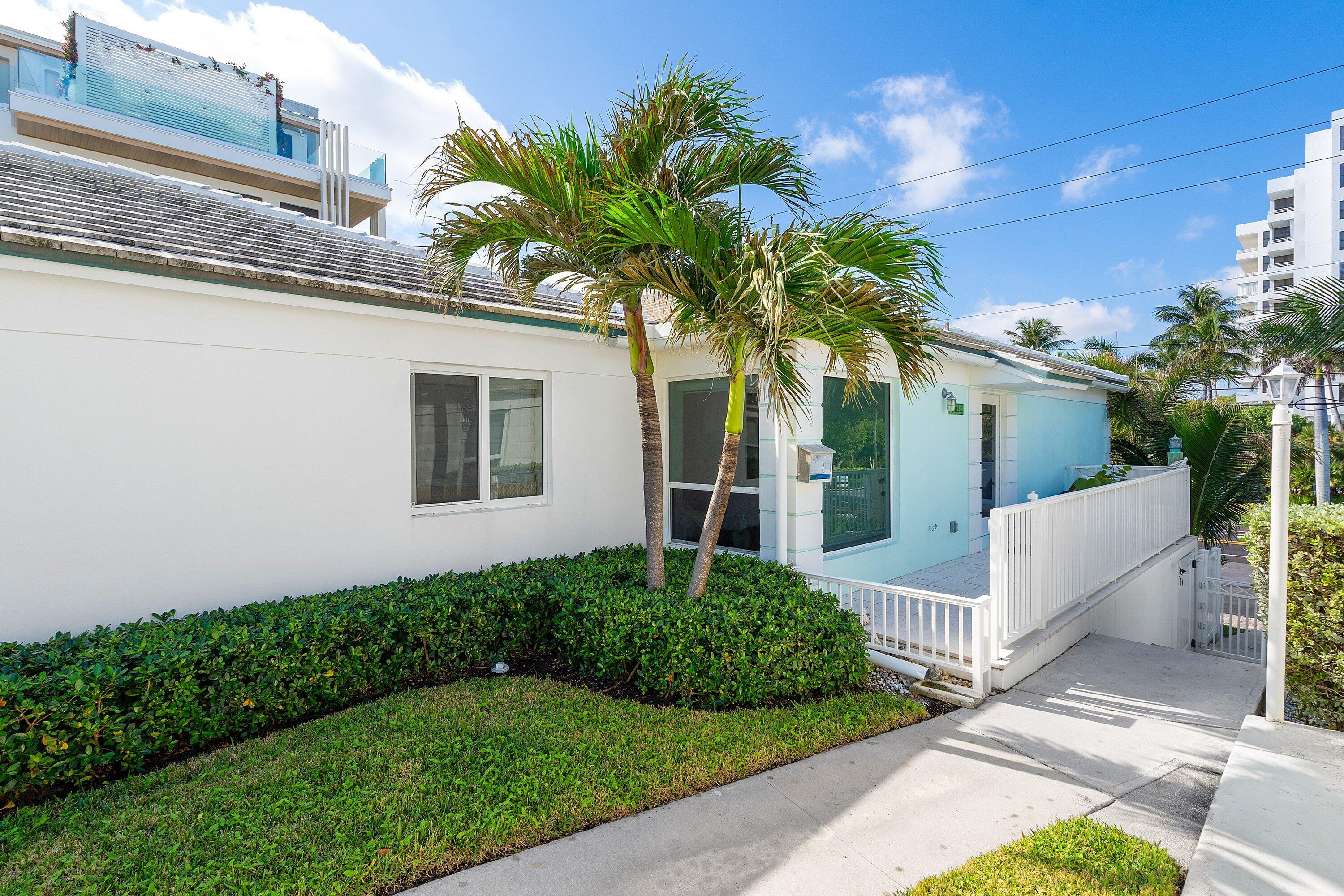 3421 South Ocean Boulevard, Unit 1 Highland Beach, FL 33487 - Photo 30 of 42 a house view with a garden space