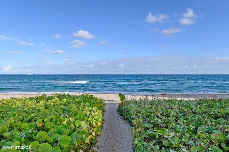 3421 South Ocean Boulevard, Unit 1 Highland Beach, FL 33487 - Photo 32 of 42 a view of an ocean beach
