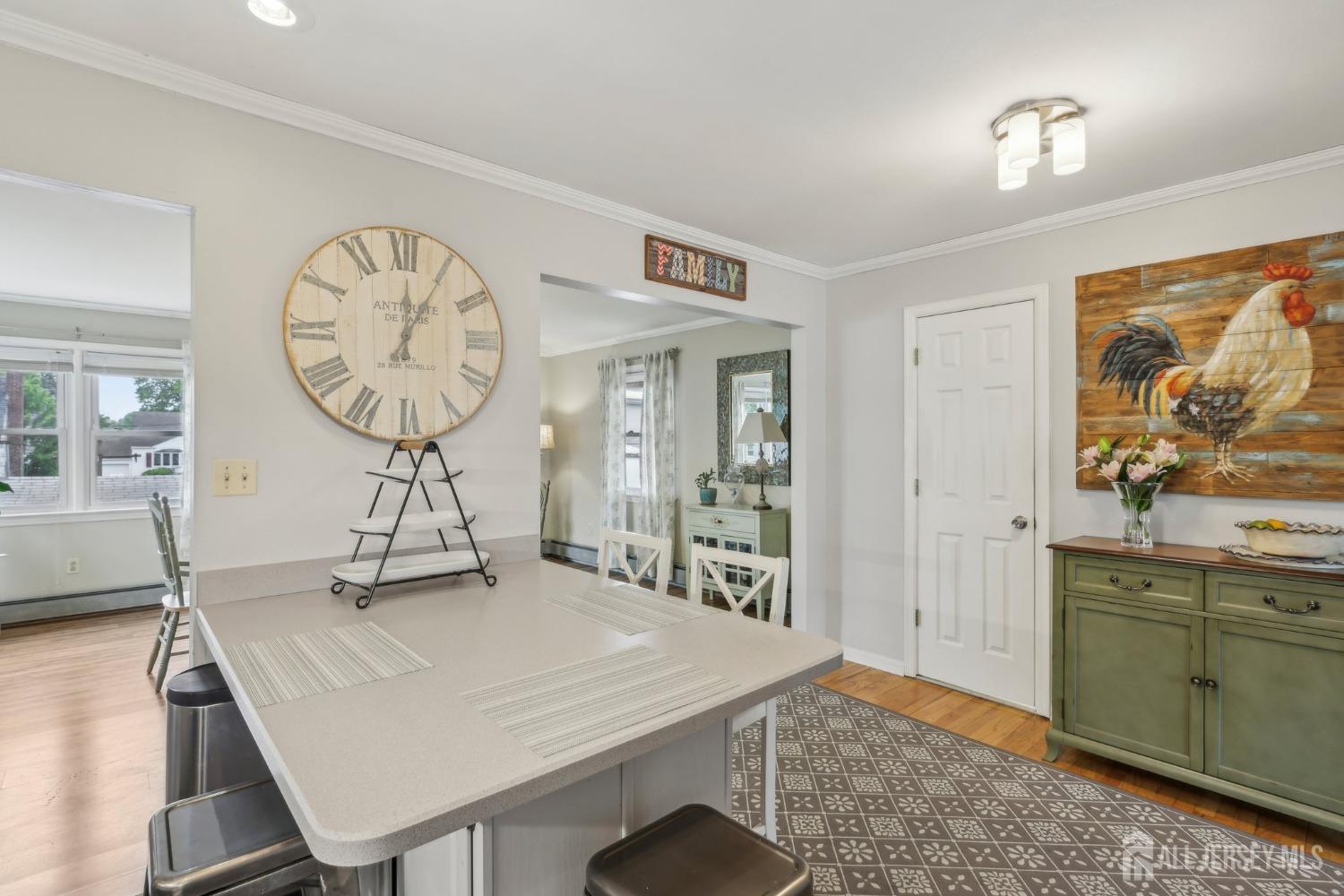 153 East Hill Road Colonia, NJ 07067 - Photo 12 of 40 a view of a dining room with furniture