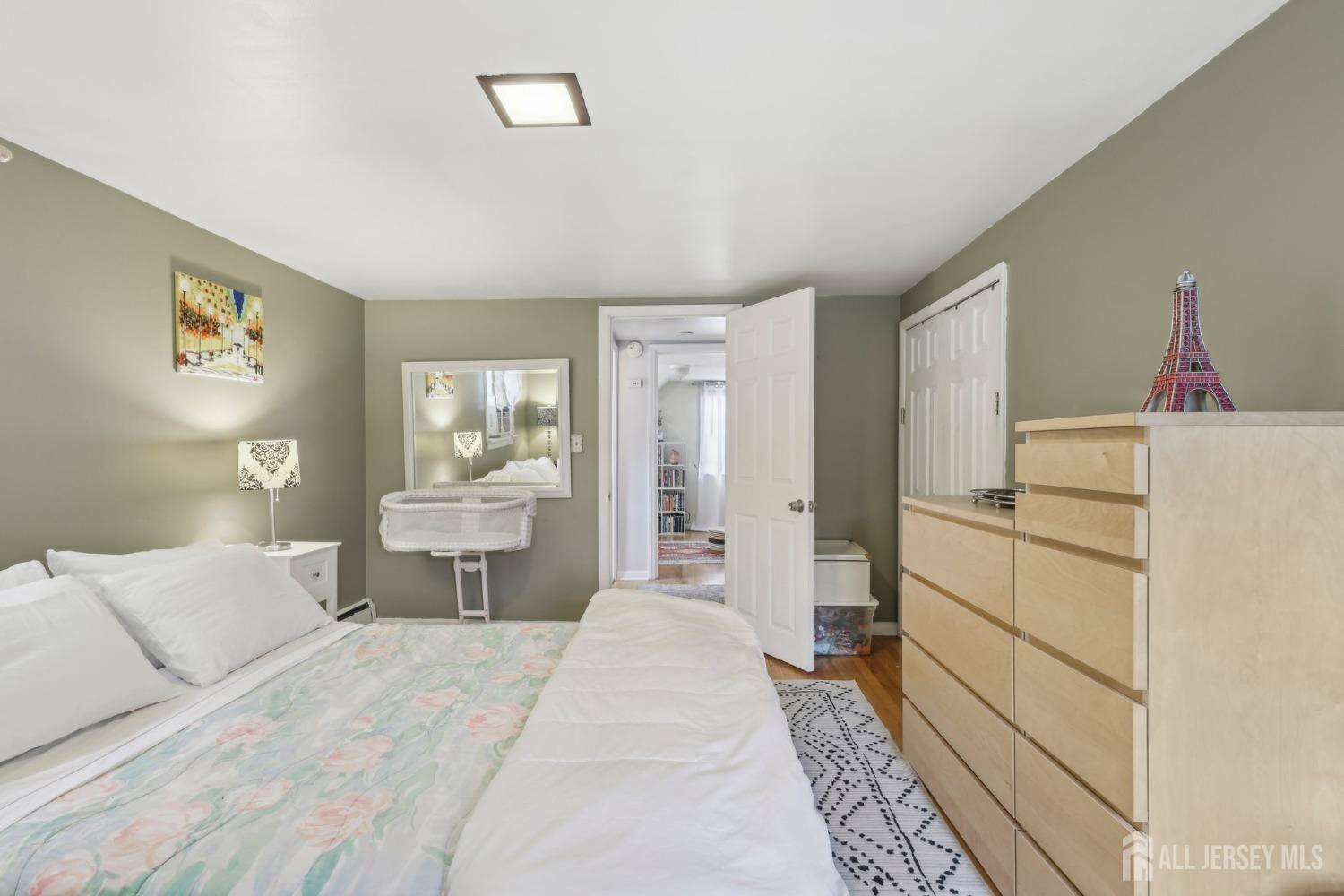 153 East Hill Road Colonia, NJ 07067 - Photo 17 of 40 a room with a bed and a view of bathroom