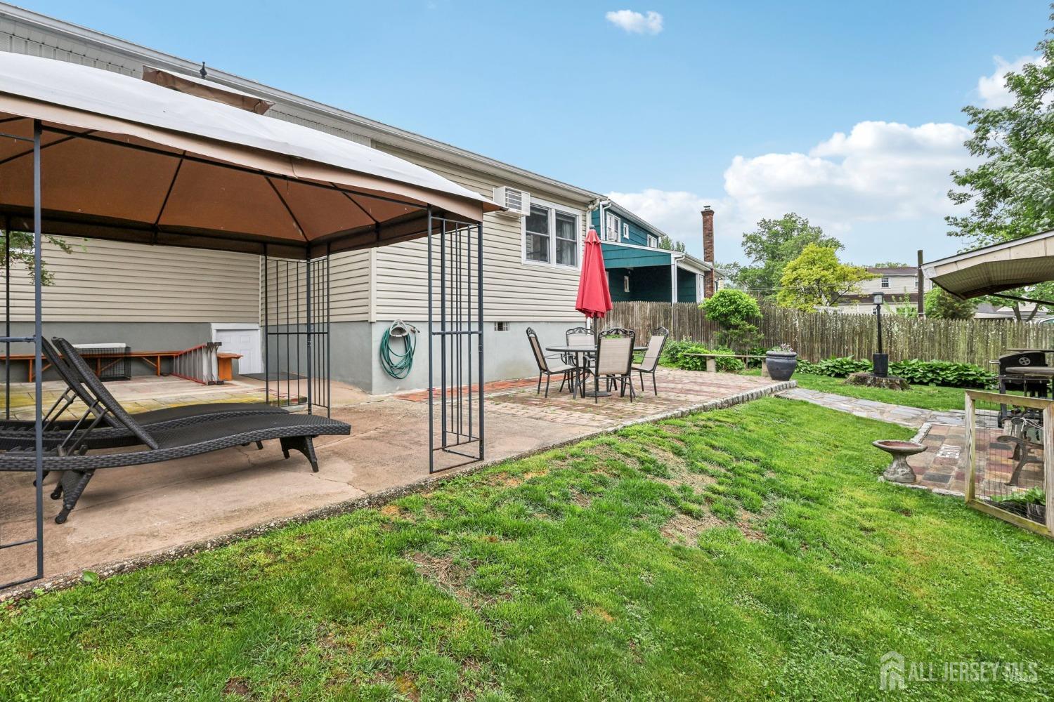 153 East Hill Road Colonia, NJ 07067 - Photo 30 of 40 a view of backyard with sitting area