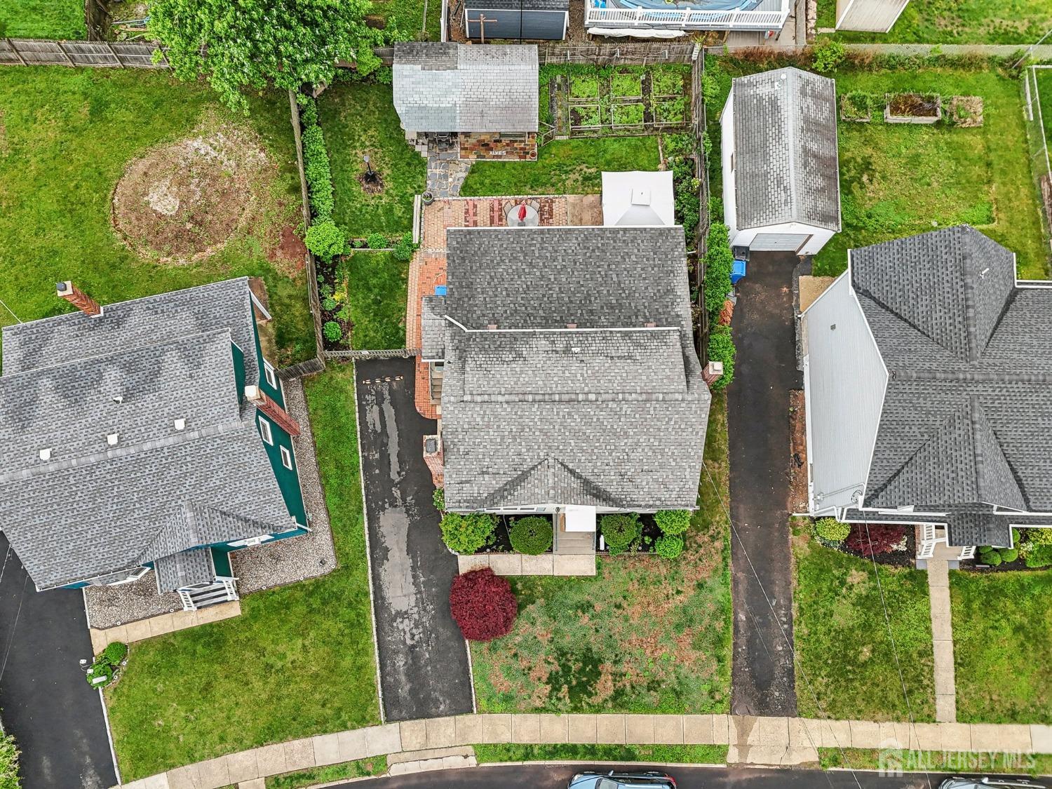 153 East Hill Road Colonia, NJ 07067 - Photo 37 of 40 an aerial view of a house with garden space and street view
