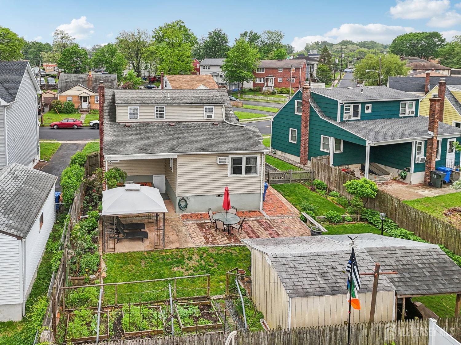153 East Hill Road Colonia, NJ 07067 - Photo 39 of 40 an aerial view of a house with garden space and street view