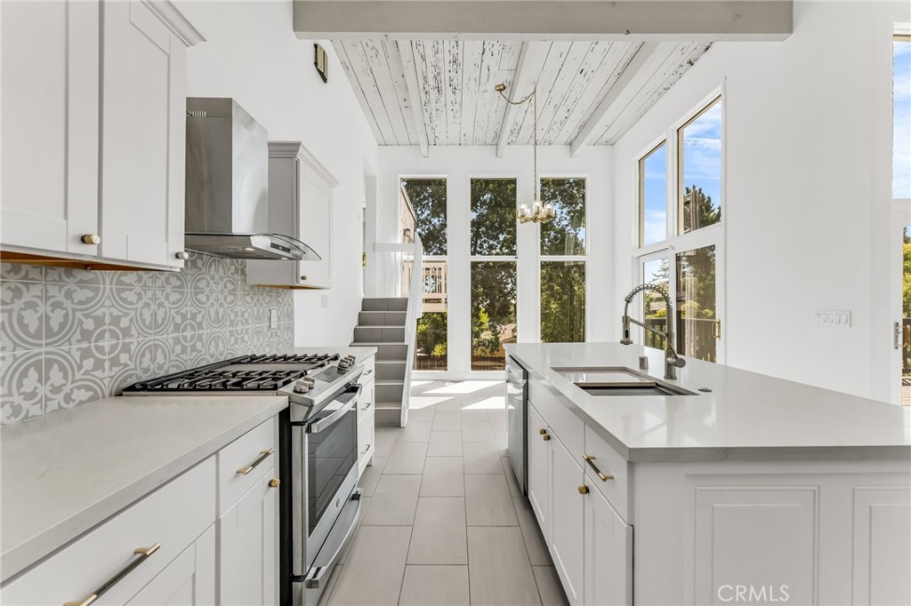 1536 Pleasant Hill Road Lafayette, CA 94549 - Photo 24 of 72 a kitchen with stainless steel appliances granite countertop a sink and a stove