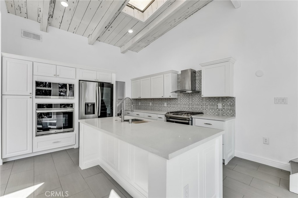 1536 Pleasant Hill Road Lafayette, CA 94549 - Photo 26 of 72 a kitchen with stainless steel appliances a stove a sink and a refrigerator