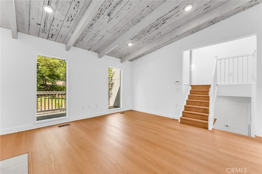1536 Pleasant Hill Road Lafayette, CA 94549 - Photo 29 of 72 a view of an empty room with wooden floor and a window