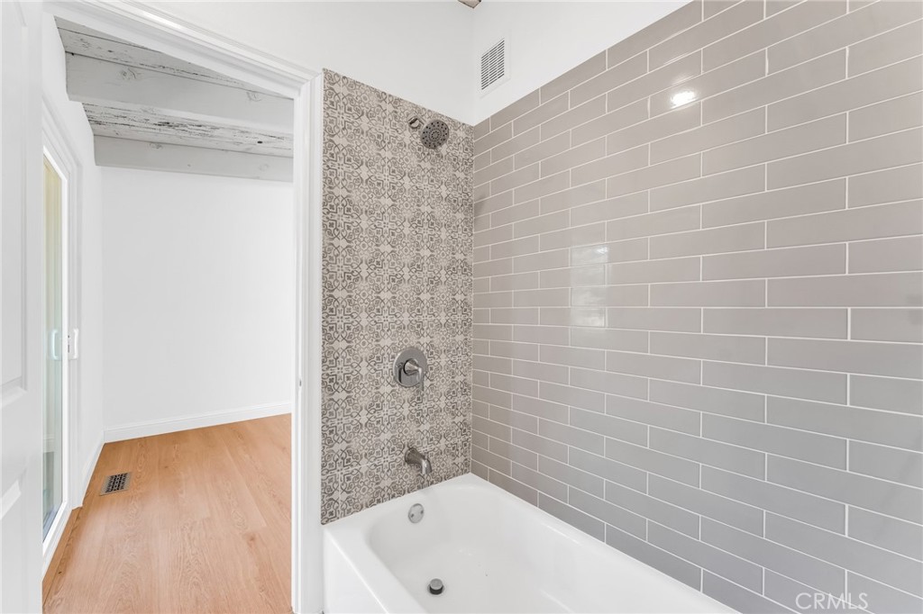 1536 Pleasant Hill Road Lafayette, CA 94549 - Photo 46 of 72 a bathroom with a bathtub and a shower