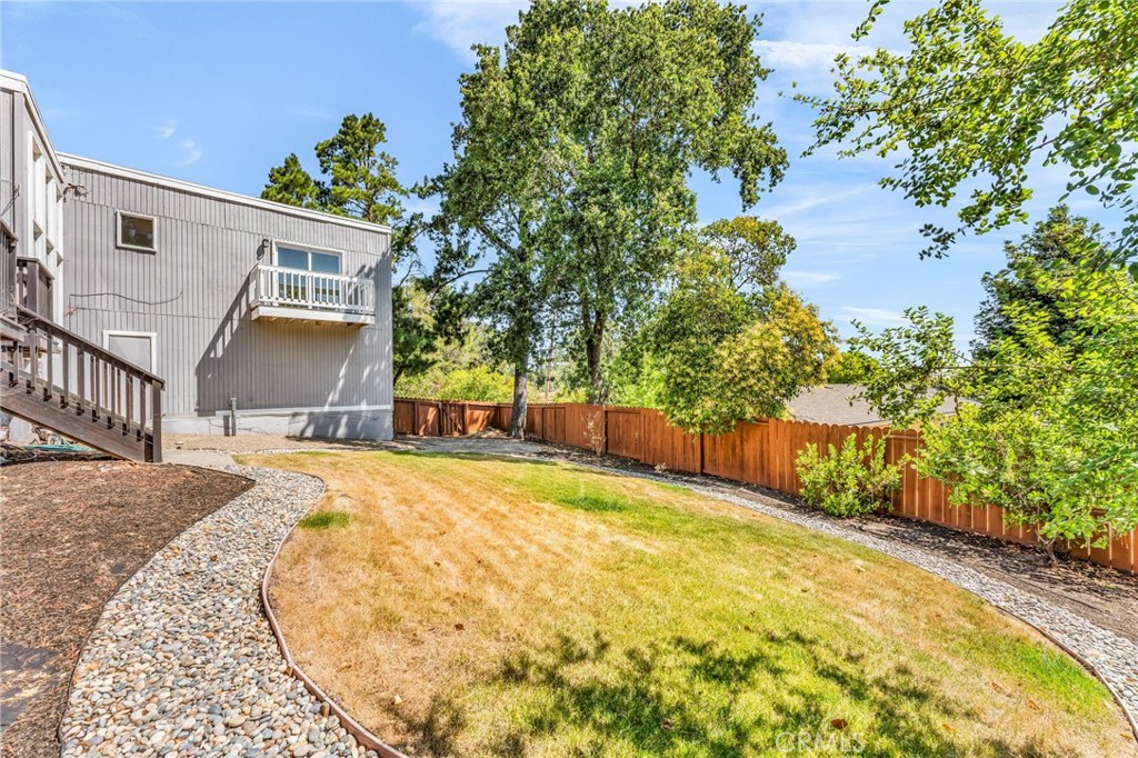 1536 Pleasant Hill Road Lafayette, CA 94549 - Photo 70 of 72 a front view of a house with a yard and garage