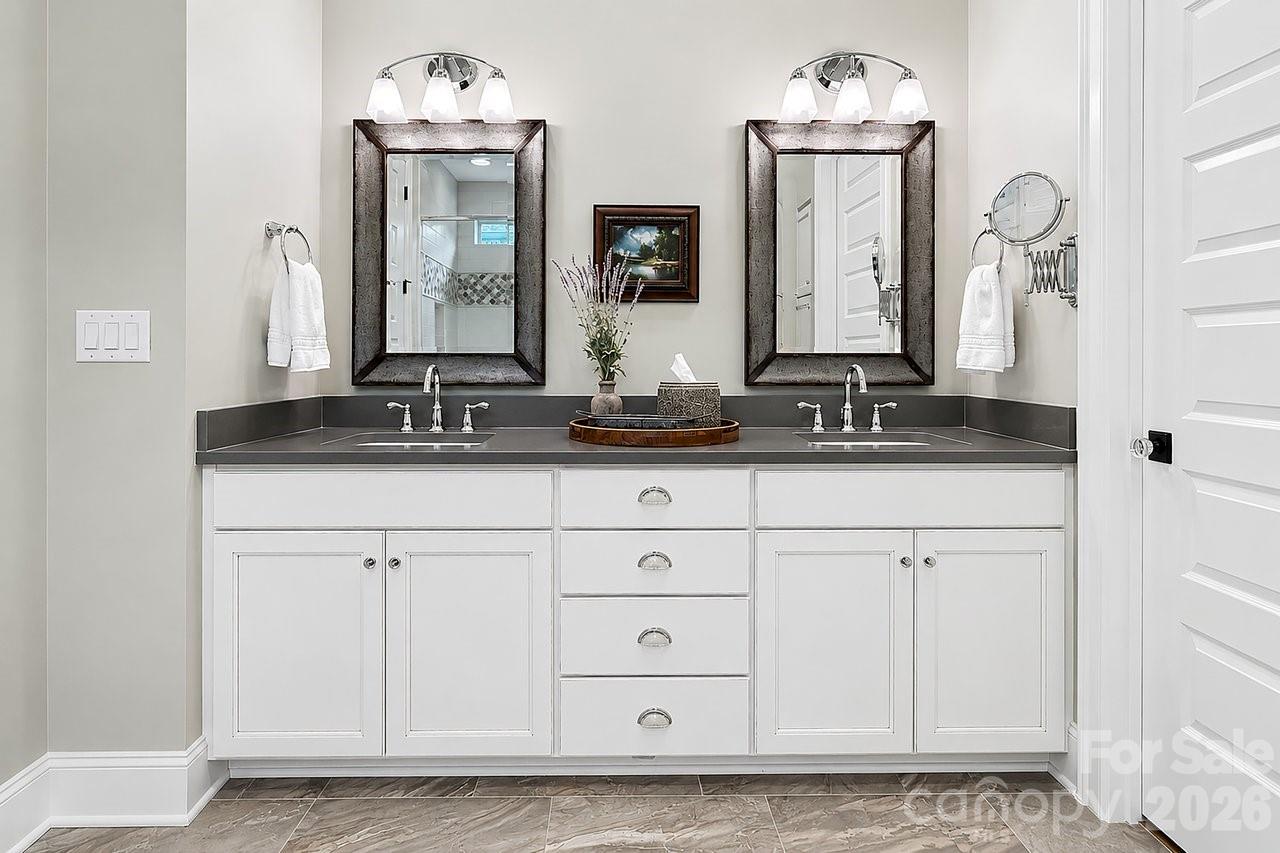 4854 Looking Glass Trail Denver, NC 28037 - Photo 38 of 48 a bathroom with double sink and a mirror