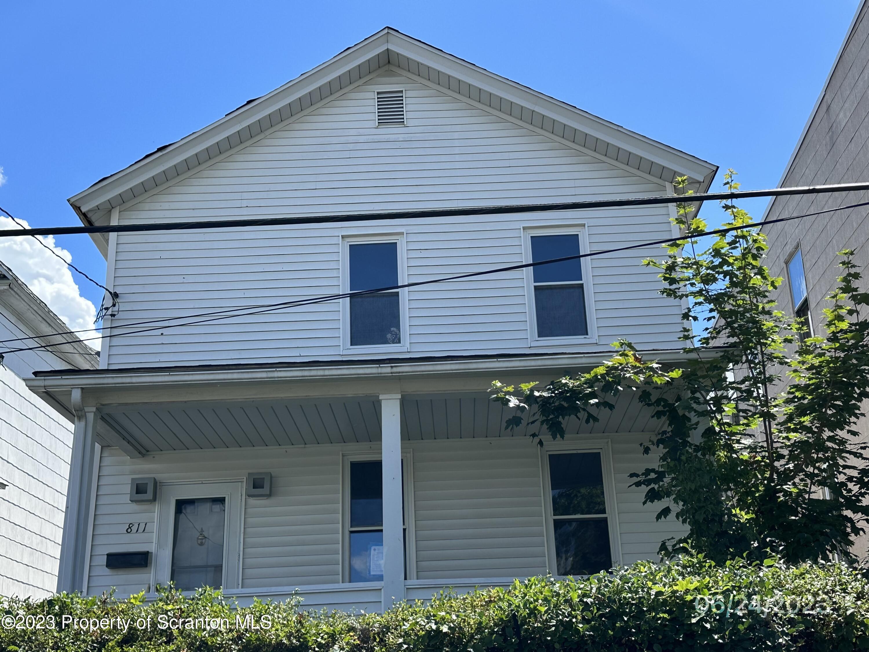 811 Eynon Street Scranton, PA 18504 - Photo 2 of 16 a front view of a house with plants