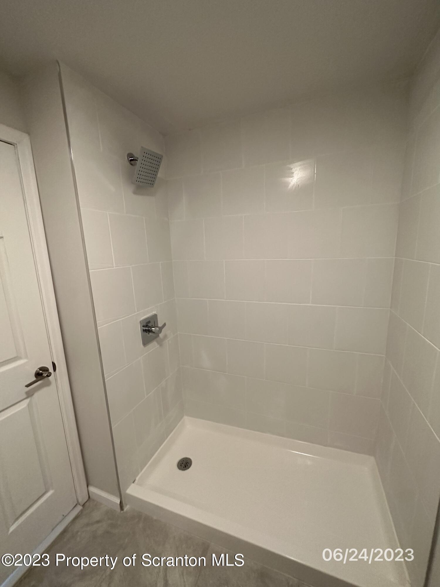 811 Eynon Street Scranton, PA 18504 - Photo 7 of 16 a bathroom with a shower