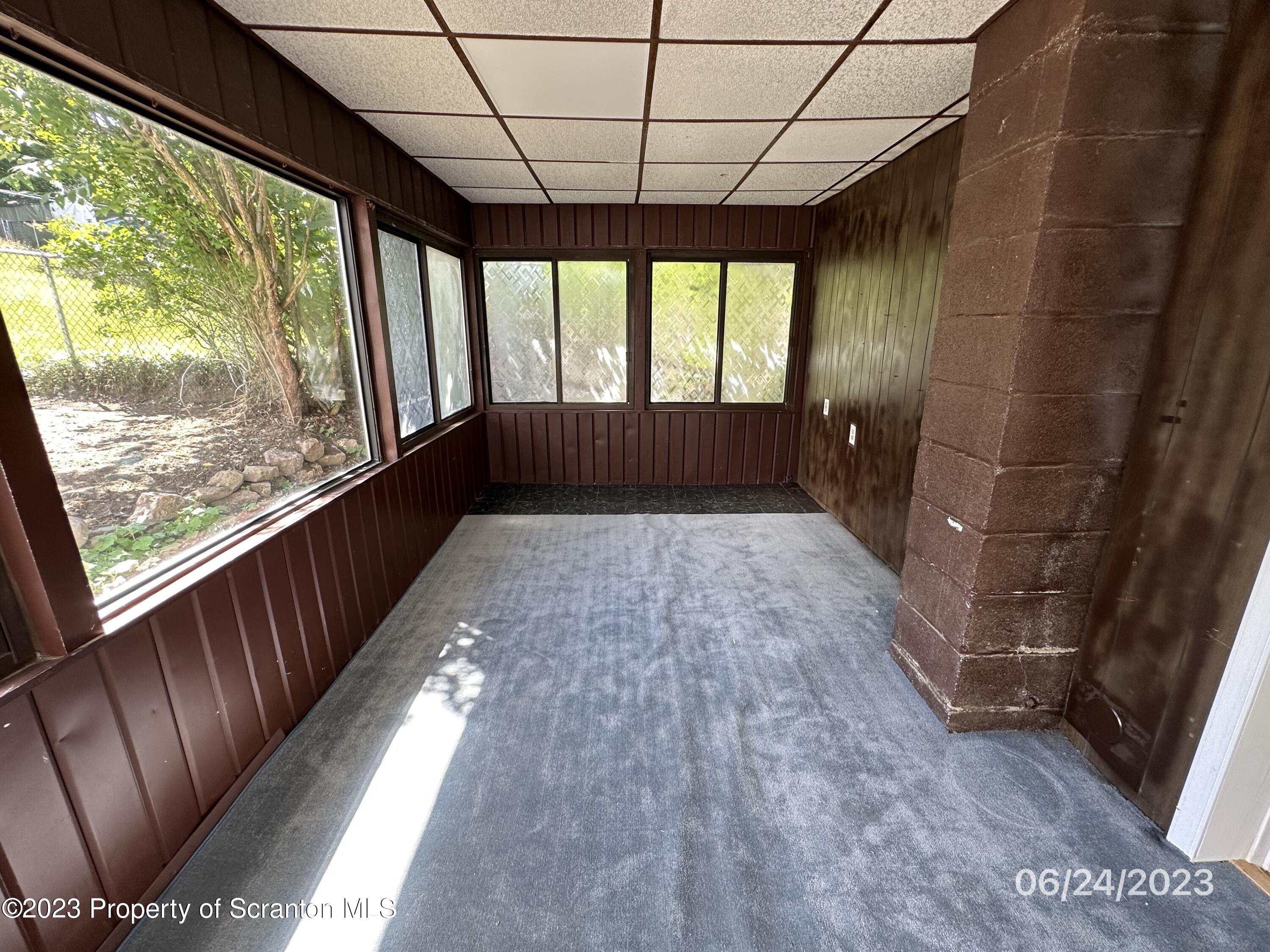 811 Eynon Street Scranton, PA 18504 - Photo 8 of 16 a view of hallway with a large window