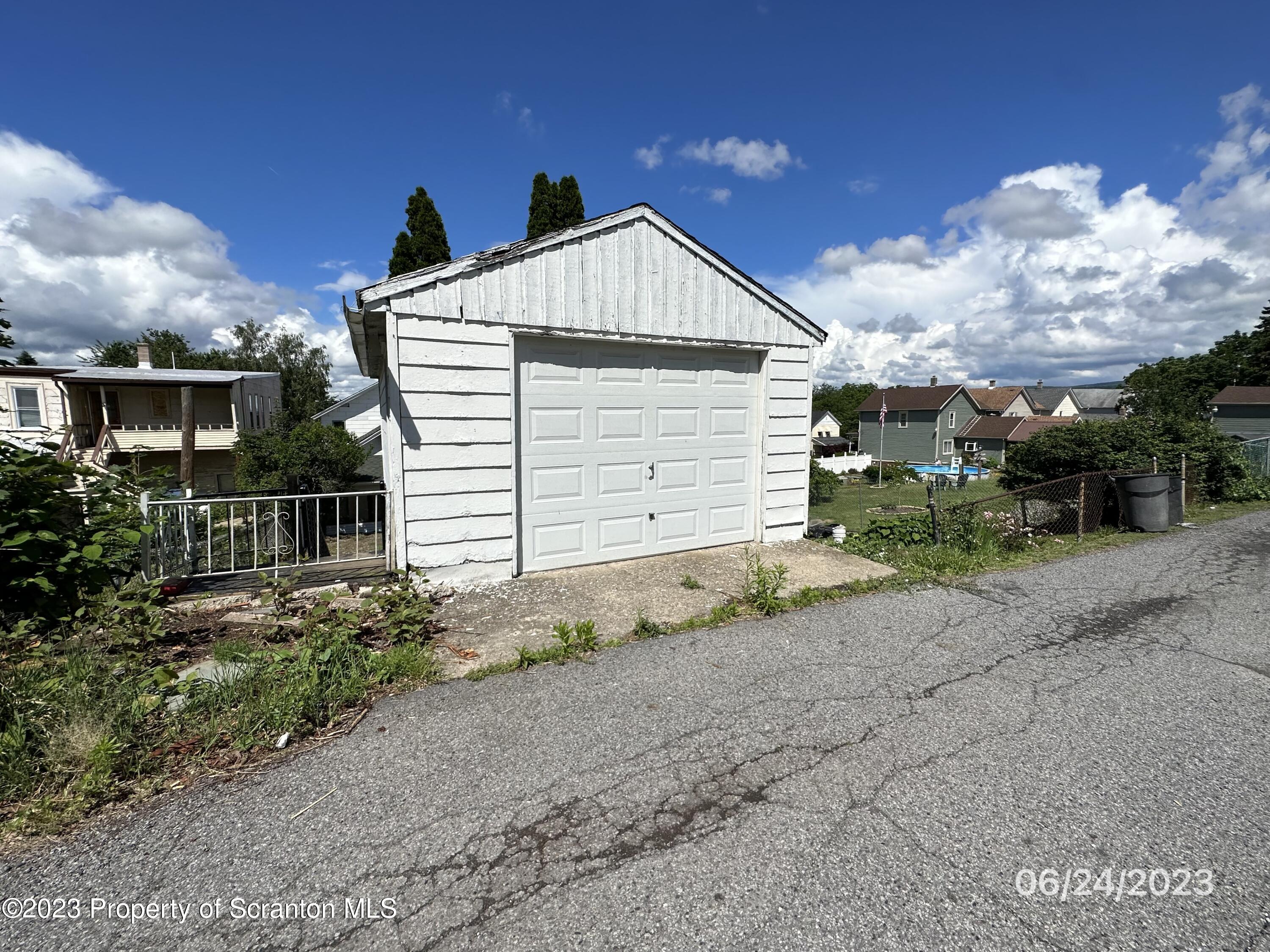 811 Eynon Street Scranton, PA 18504 - Photo 10 of 16 a view of a house with a yard
