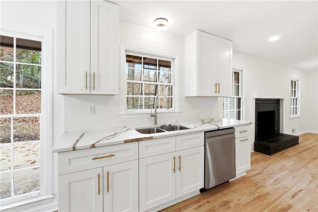 2520 Overlook Way Northeast Atlanta, GA 30345 - Photo 15 of 31 a kitchen with a sink stove and cabinets