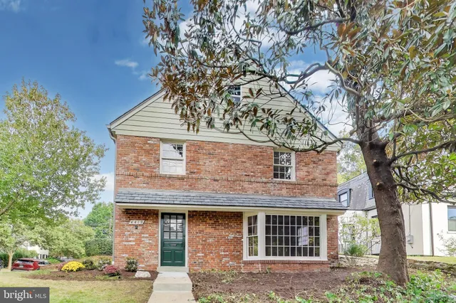 a picture of a bathroom with a shower