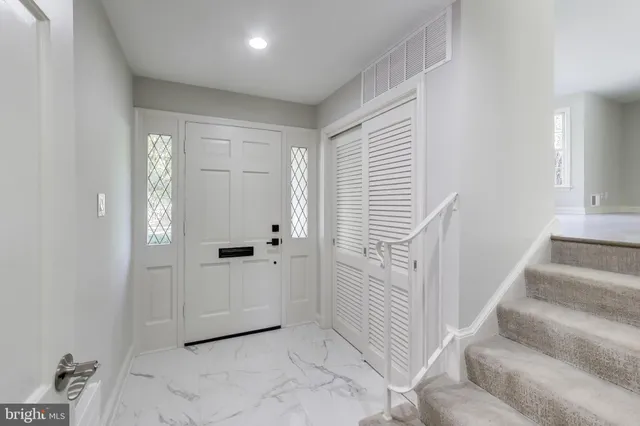 a view of an entryway with staircase