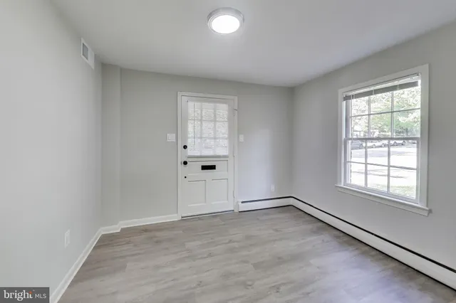 an empty room with windows