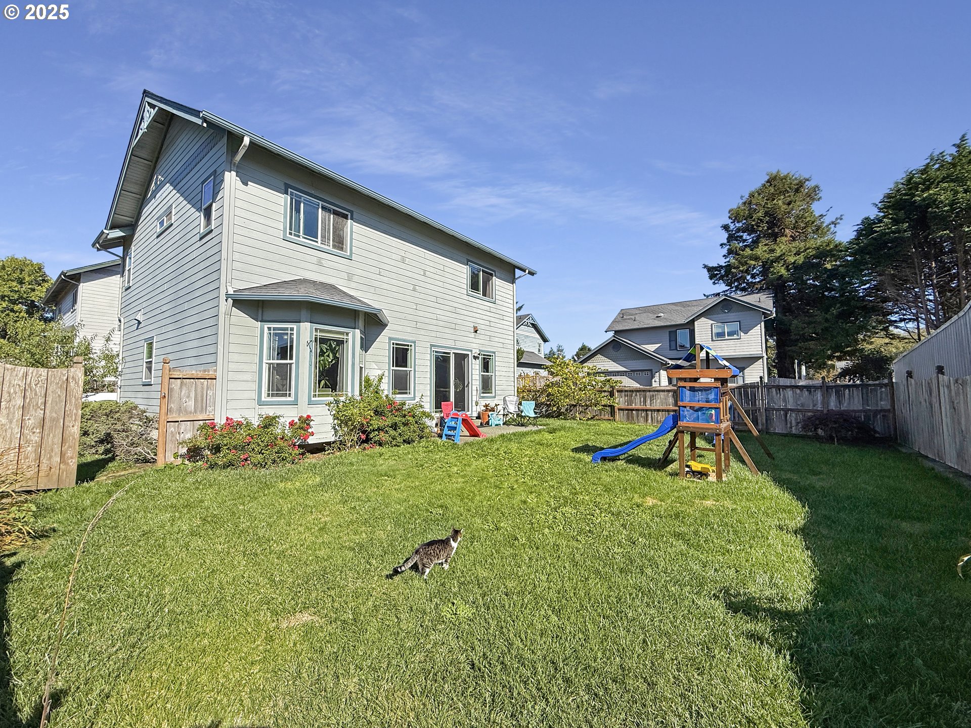 731 3rd Street, Unit C / 3 Brookings, OR 97415 - Photo 5 of 42 a view of an house with backyard space and sitting area