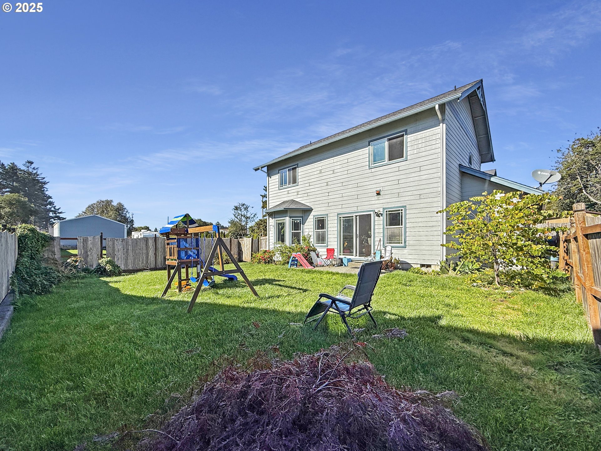 731 3rd Street, Unit C / 3 Brookings, OR 97415 - Photo 6 of 42 a view of a house with backyard