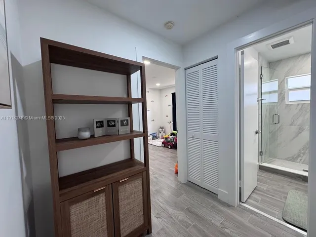 workspace with wooden floor and window