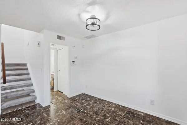 a view of entryway with stairs