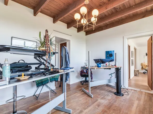 a view of a room with gym equipment