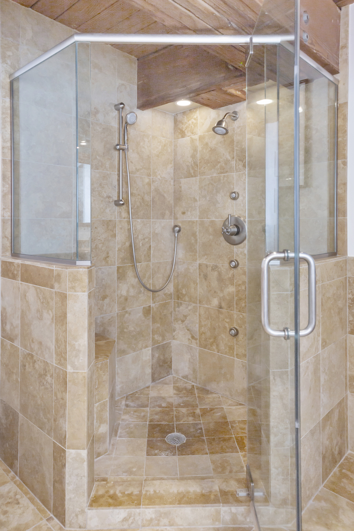 1000 West Washington Boulevard, Unit 142 Chicago, IL 60607 - Photo 13 of 24 a bathroom with a glass shower door