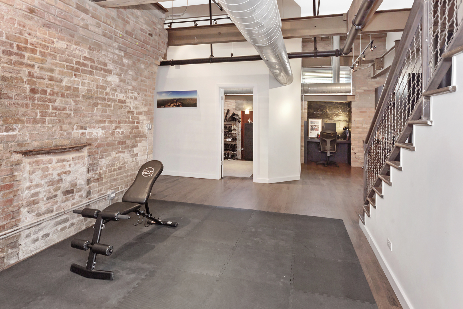 1000 West Washington Boulevard, Unit 142 Chicago, IL 60607 - Photo 16 of 24 a view of a workspace with furniture
