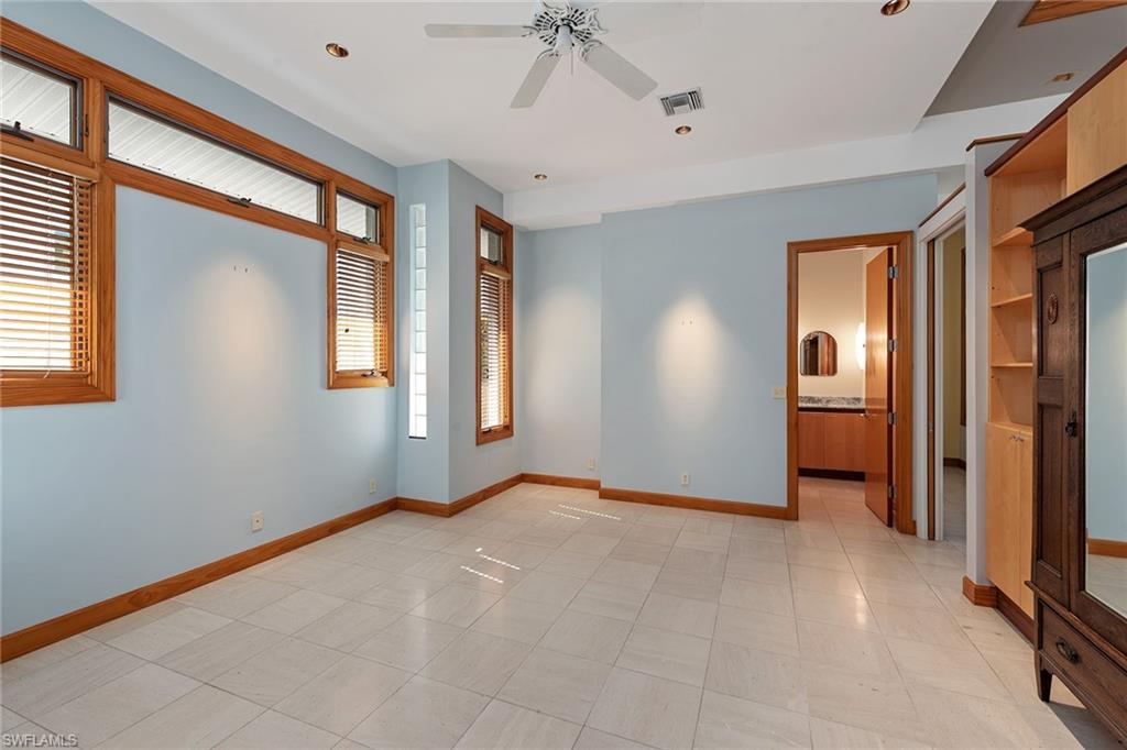 550 Starboard Drive Naples, FL 34103 - Photo 13 of 28 a view of an empty room with a window