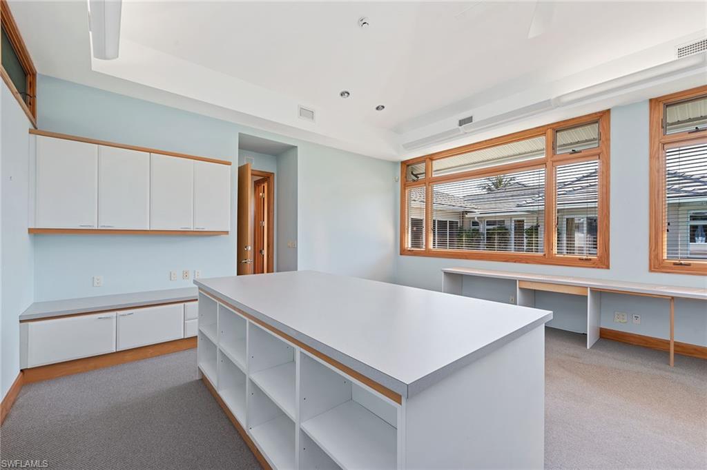 550 Starboard Drive Naples, FL 34103 - Photo 17 of 28 a room with pool table and windows