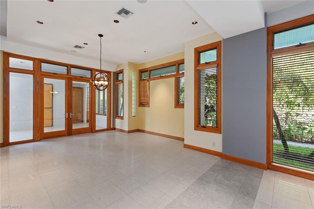 550 Starboard Drive Naples, FL 34103 - Photo 18 of 28 a view of an empty room with a window