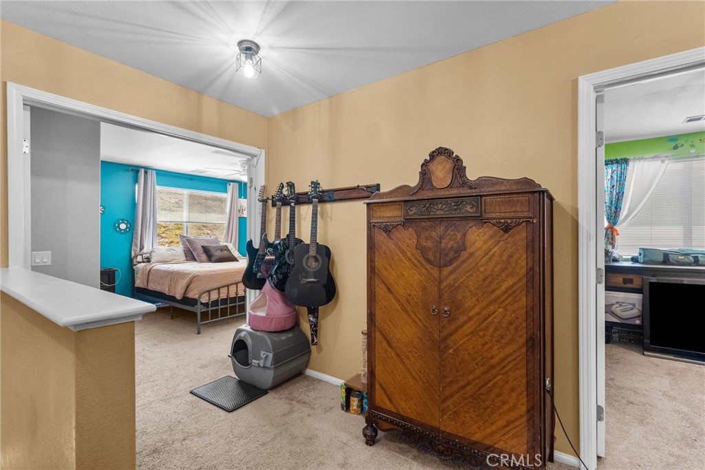 26135 Gravett Place Saugus, CA 91350 - Photo 15 of 31 a bedroom with bed and window