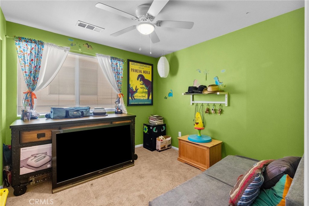 26135 Gravett Place Saugus, CA 91350 - Photo 19 of 31 a living room with furniture and a large window