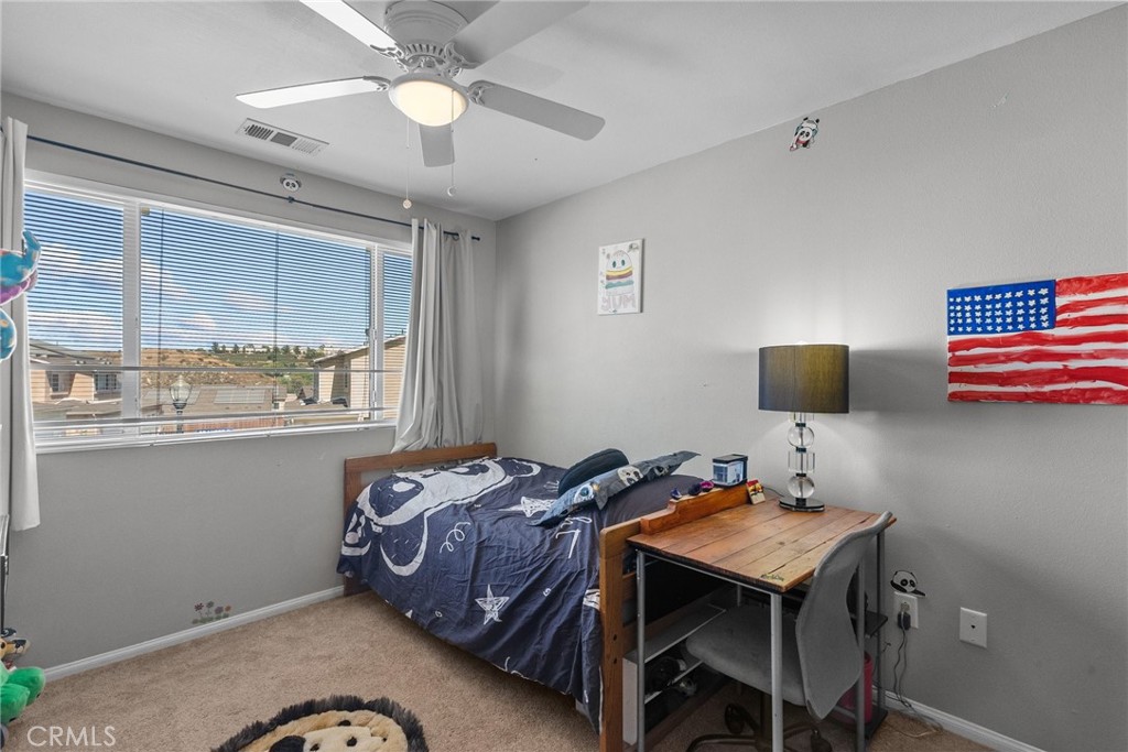 26135 Gravett Place Saugus, CA 91350 - Photo 22 of 31 a bedroom with a bed and a window
