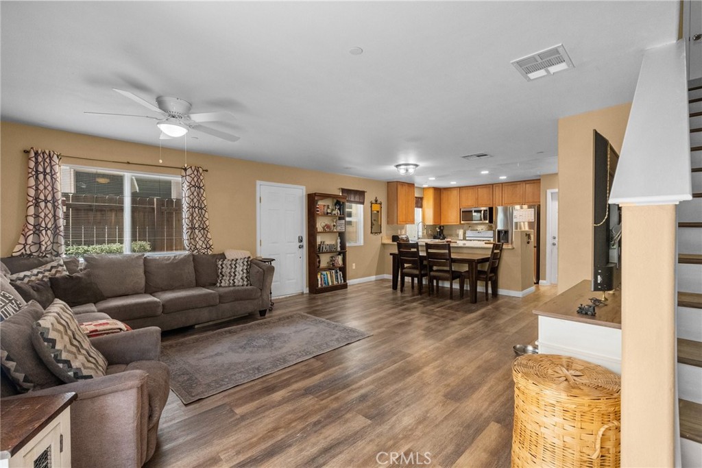 26135 Gravett Place Saugus, CA 91350 - Photo 10 of 31 a living room with furniture and kitchen view