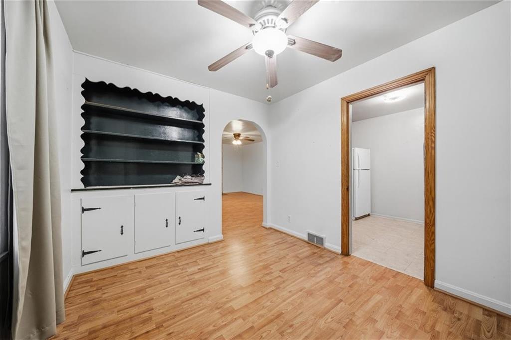 828 Dearborn Street Baden, PA 15005 - Photo 12 of 26 a view of empty room with wooden floor
