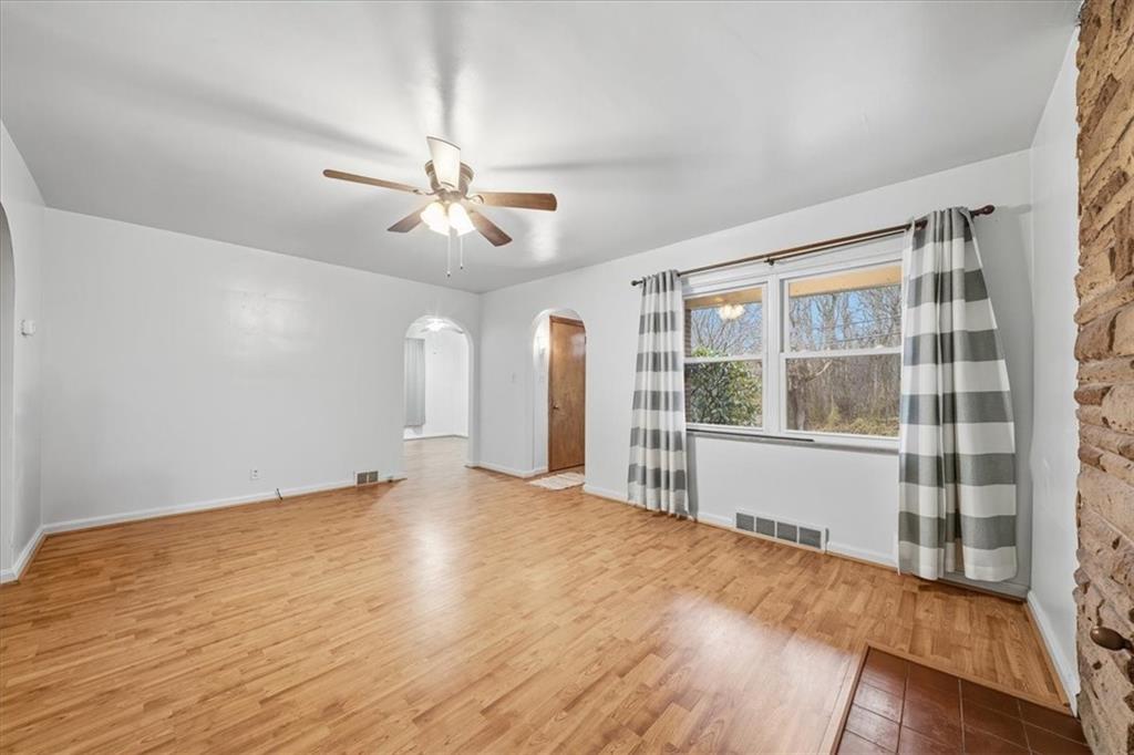 828 Dearborn Street Baden, PA 15005 - Photo 10 of 26 a view of an empty room with a window