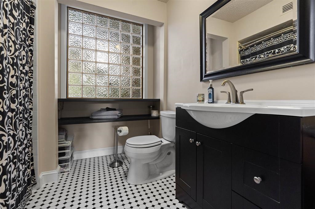 100 Saturn Road St. Augustine, FL 32086 - Photo 11 of 29 a bathroom with a sink toilet and vanity