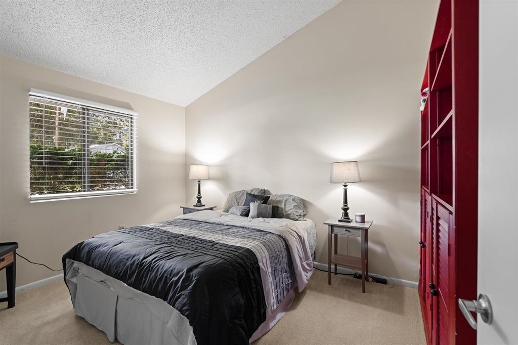 100 Saturn Road St. Augustine, FL 32086 - Photo 15 of 29 a bedroom with a bed and a window