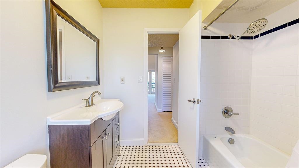 100 Saturn Road St. Augustine, FL 32086 - Photo 16 of 29 a bathroom with a sink a toilet and shower